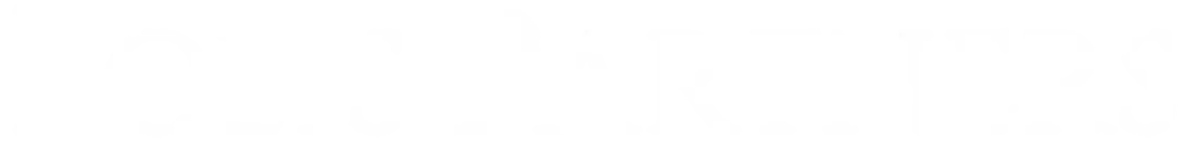 A young woman in a leopard print dress posing indoors with a smile.