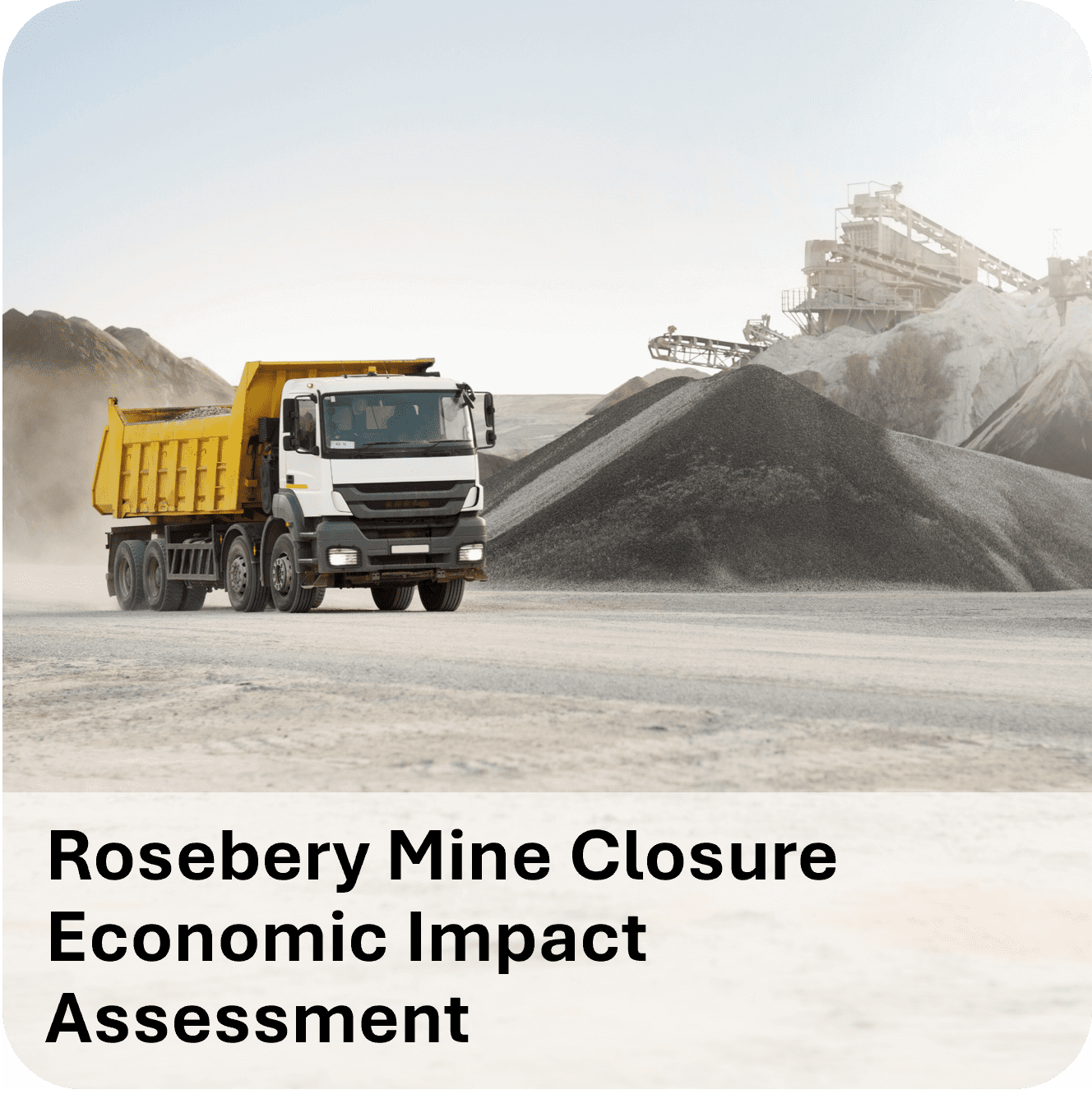 Dump truck near a large pile of mined materials at Rosebery Mine.