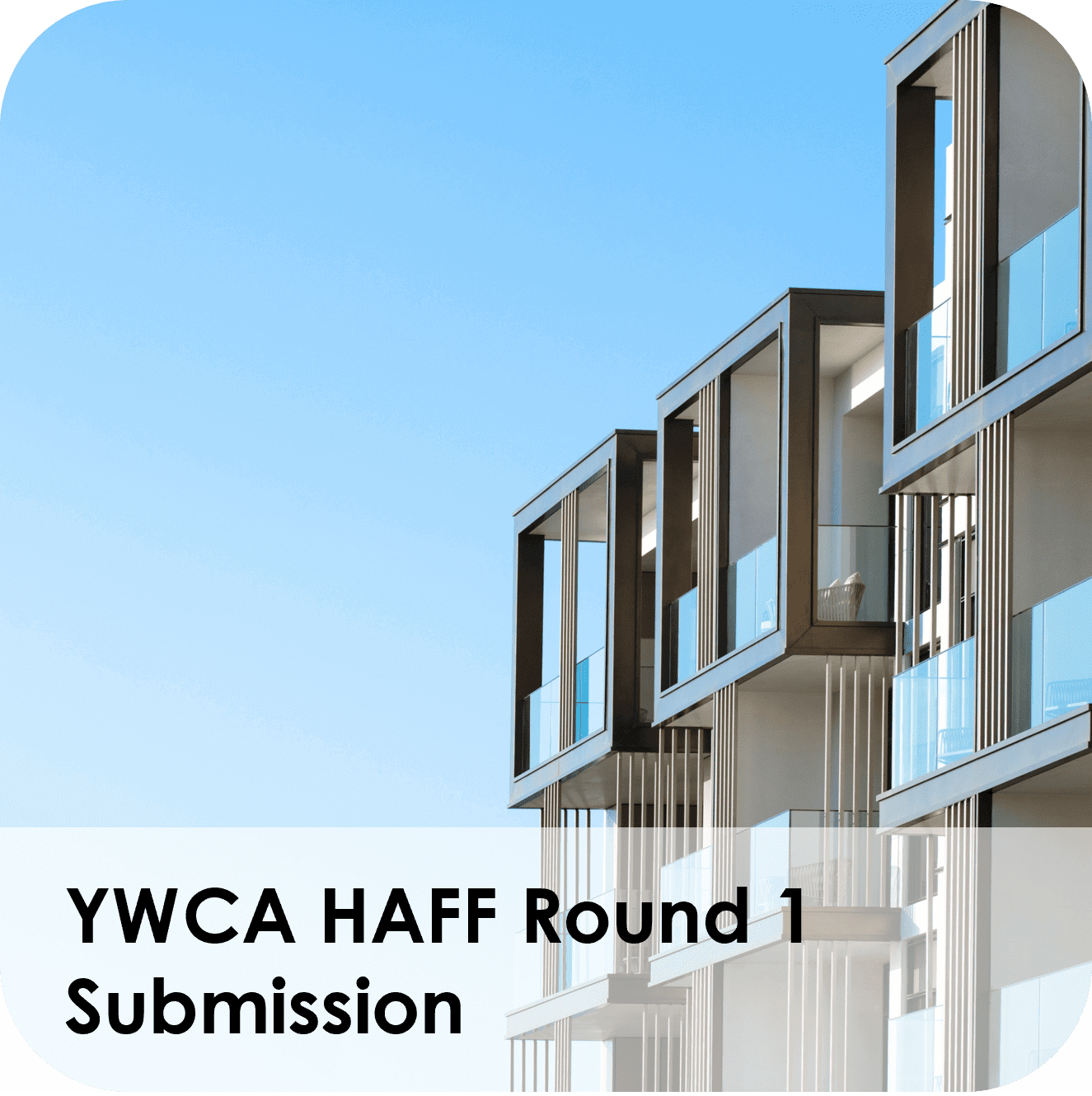 Modern multi-story residential buildings under clear blue sky.