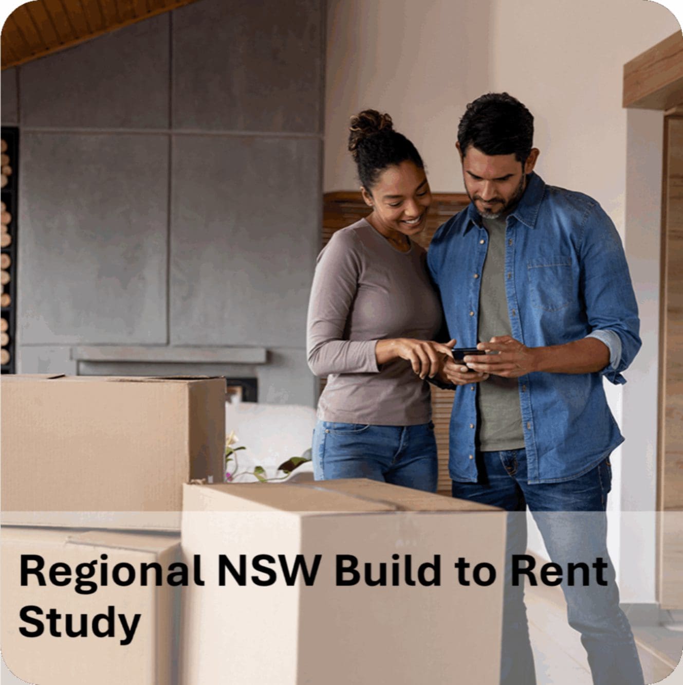 Couple unpacking with phone and moving boxes