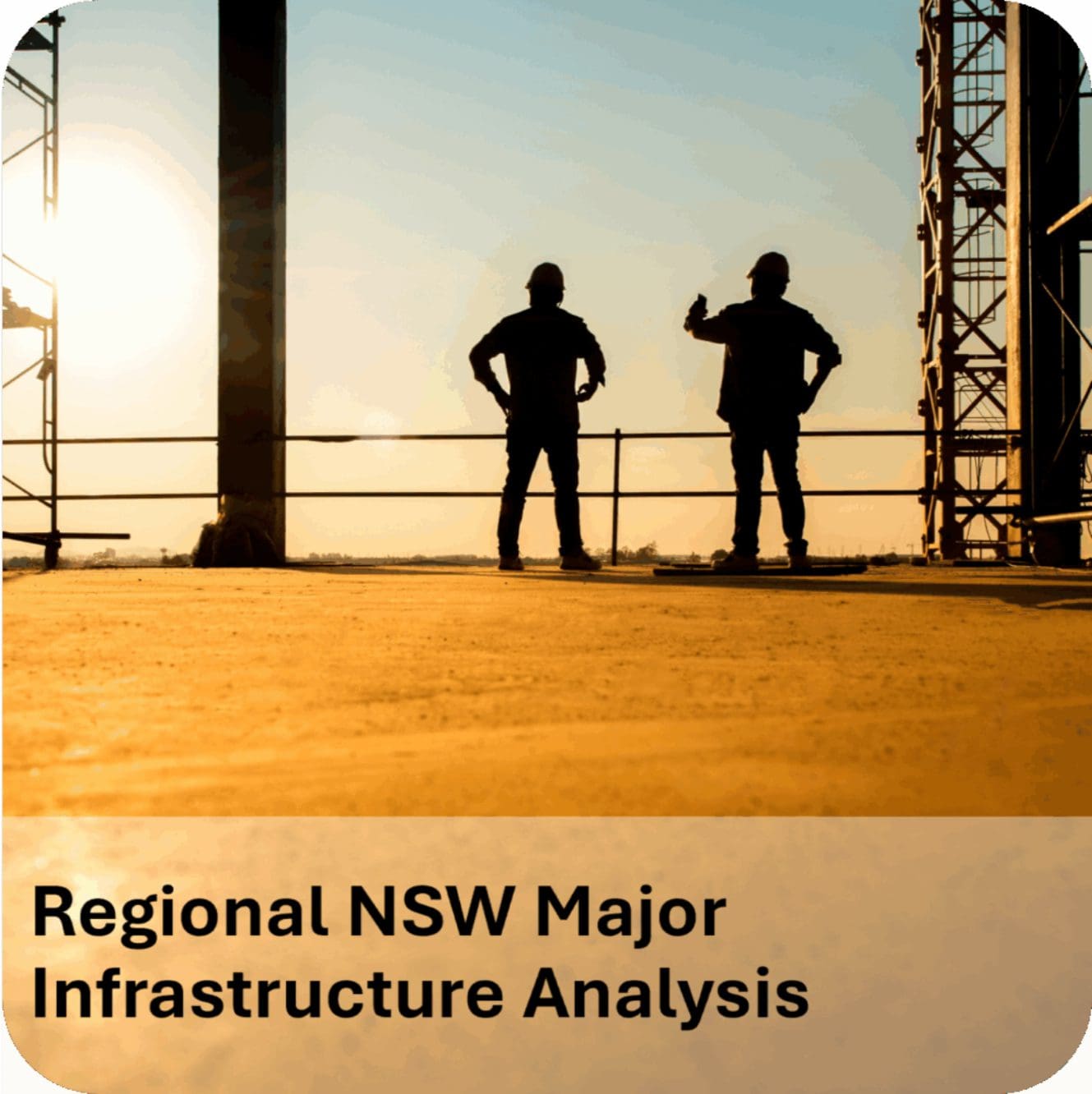 Silhouetted construction workers at infrastructure site