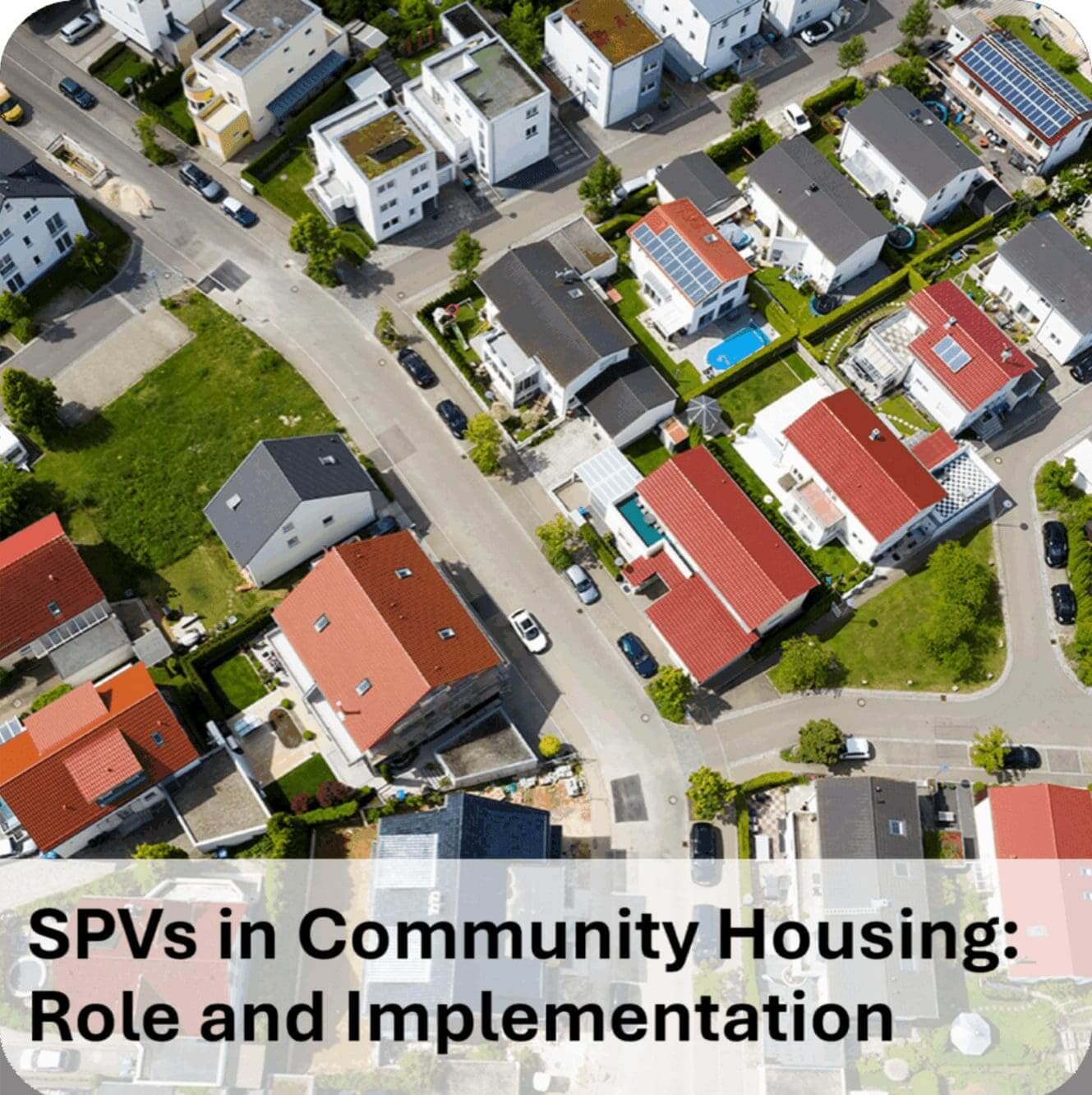 Aerial view of suburban neighborhood with red roofs