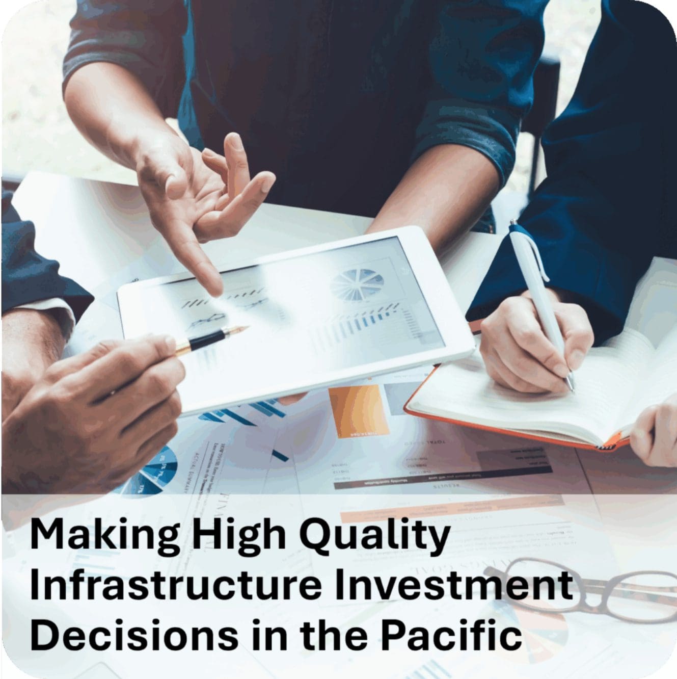 Team reviewing infrastructure investment charts on tablet