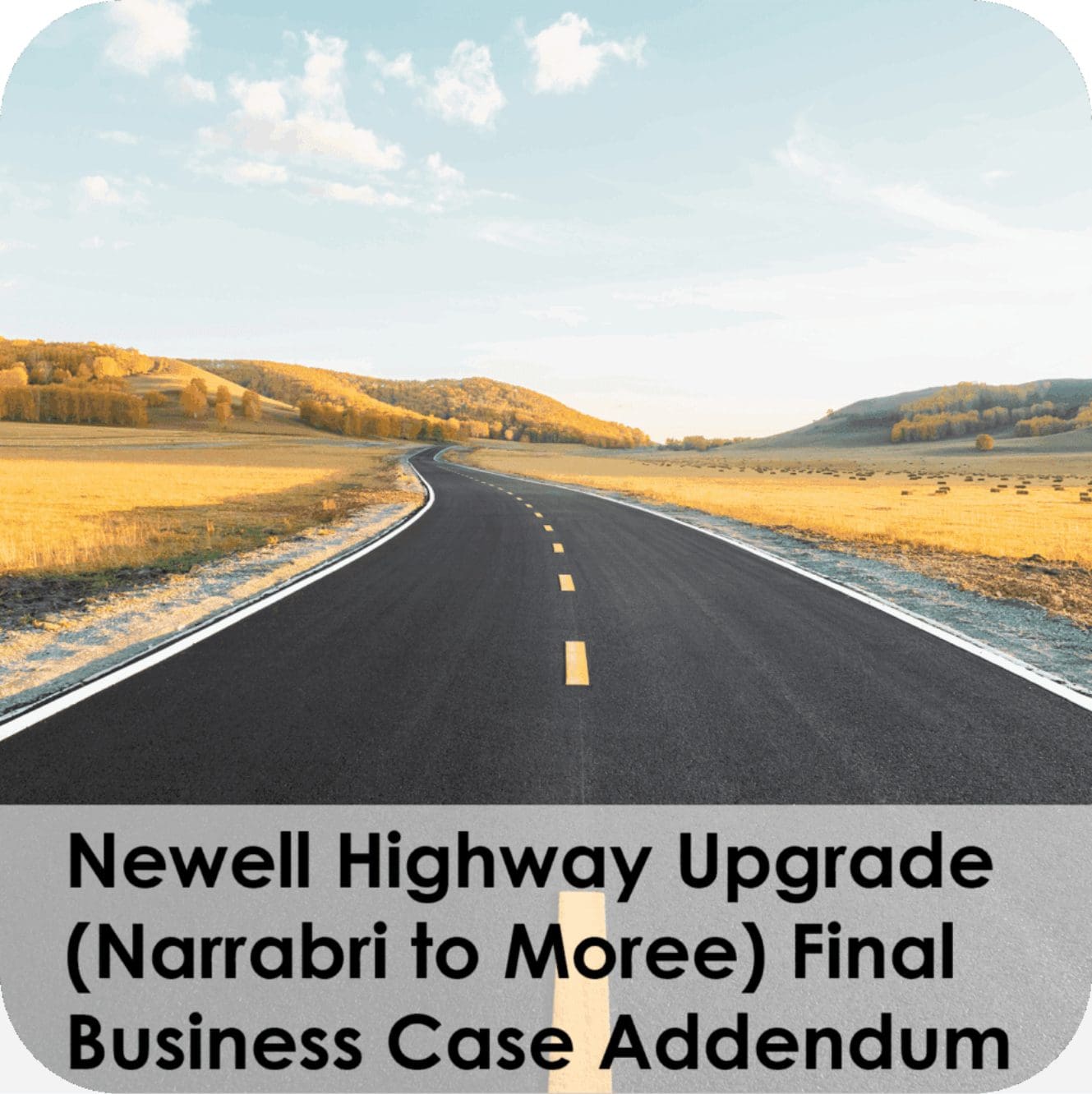 Newly paved highway through sunlit countryside