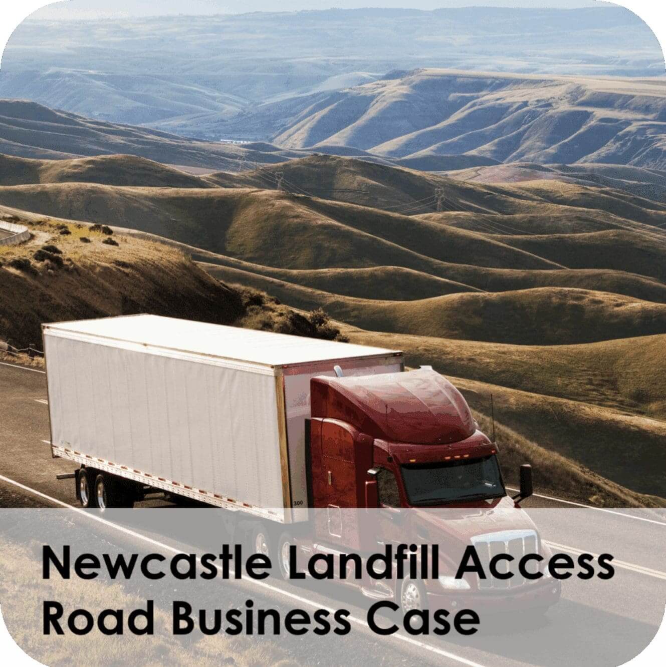 Red semi truck on winding hilly highway