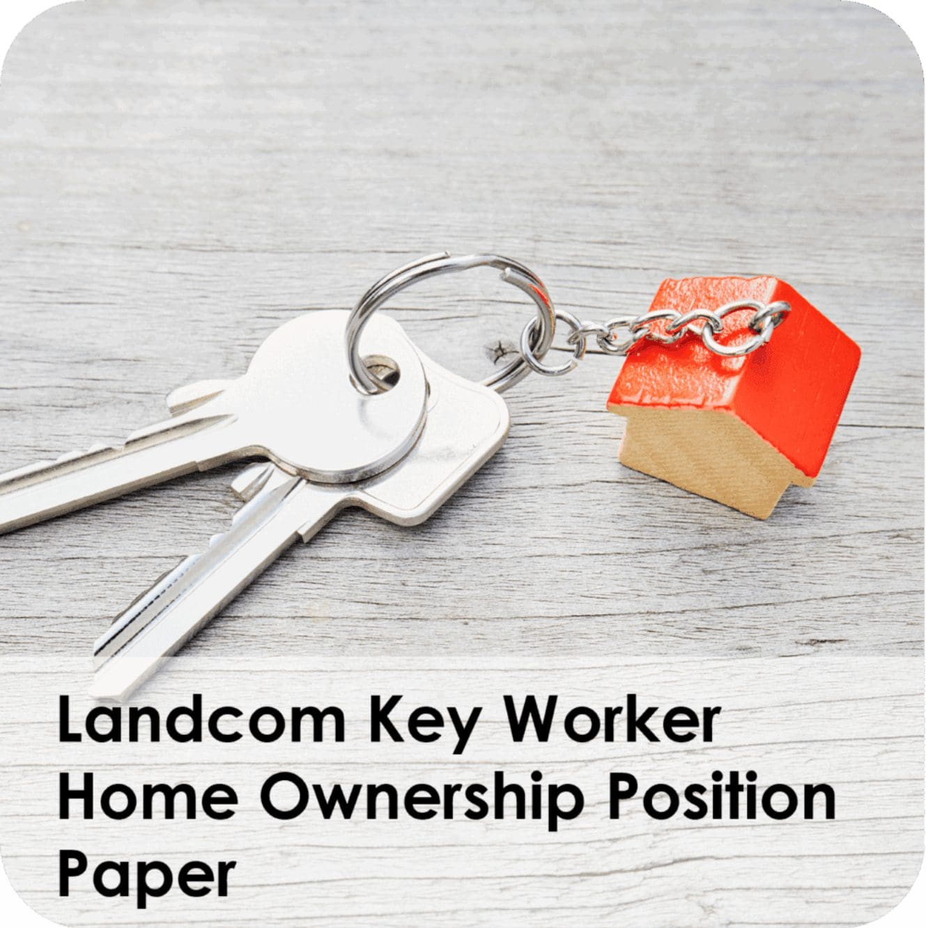 Silver keys with red-roof house keychain