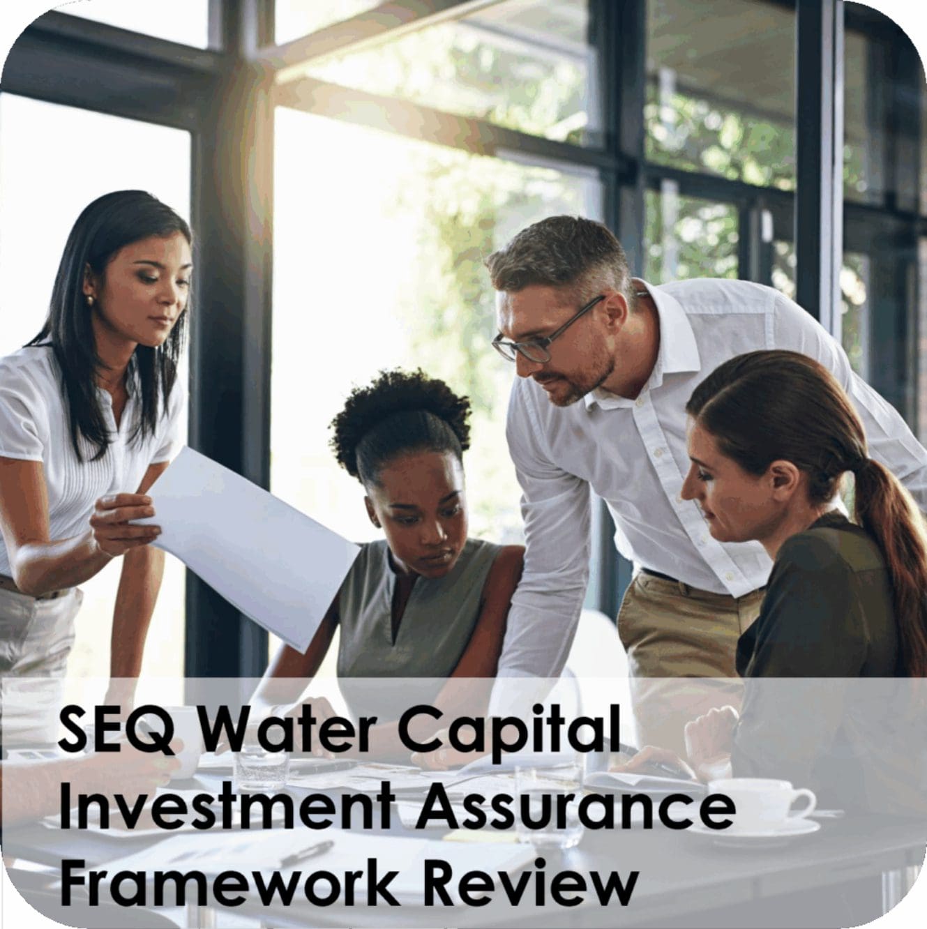 Diverse team reviewing investment framework documents