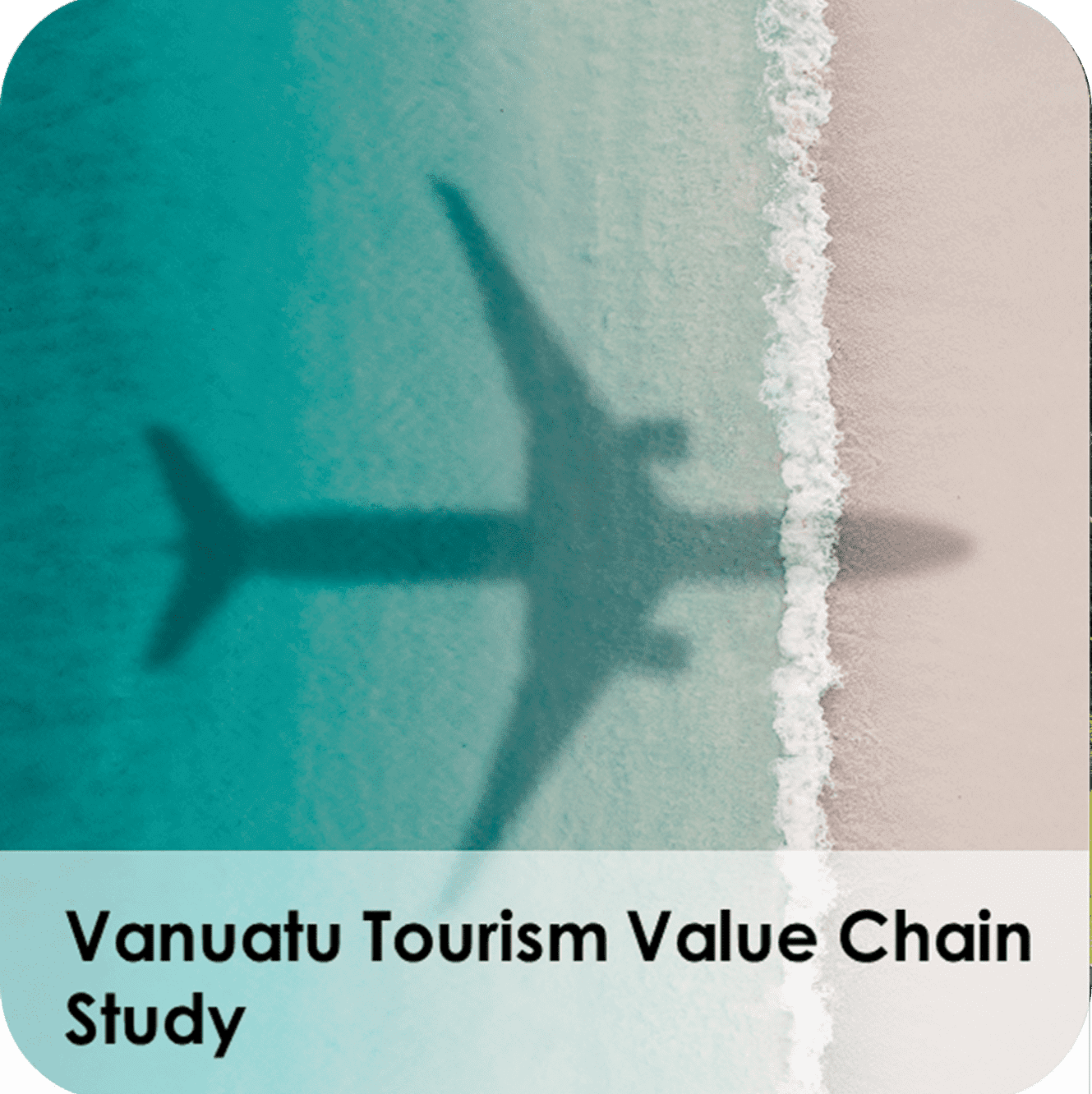 Airplane shadow over turquoise surf and sand