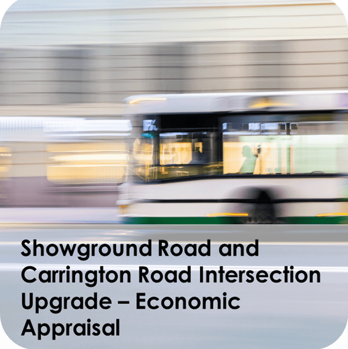 Blurred bus speeding through city street