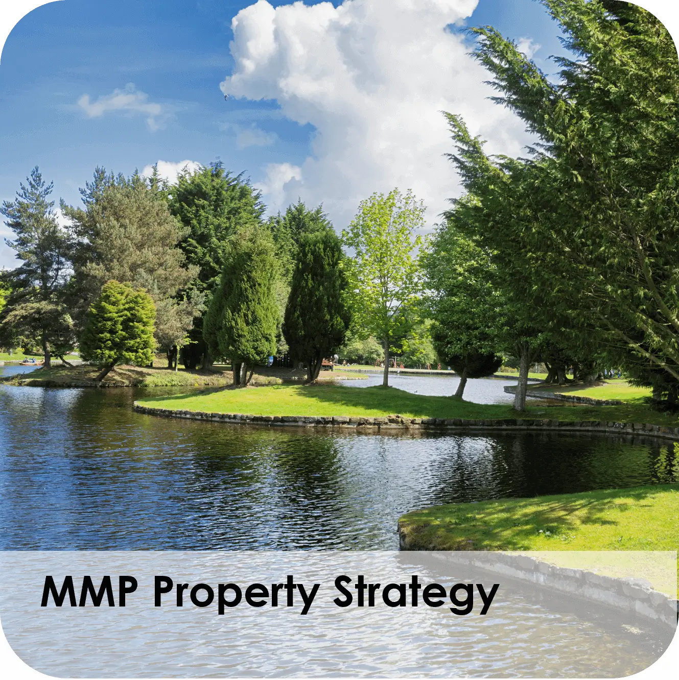 A serene pond surrounded by lush green trees under a blue sky.